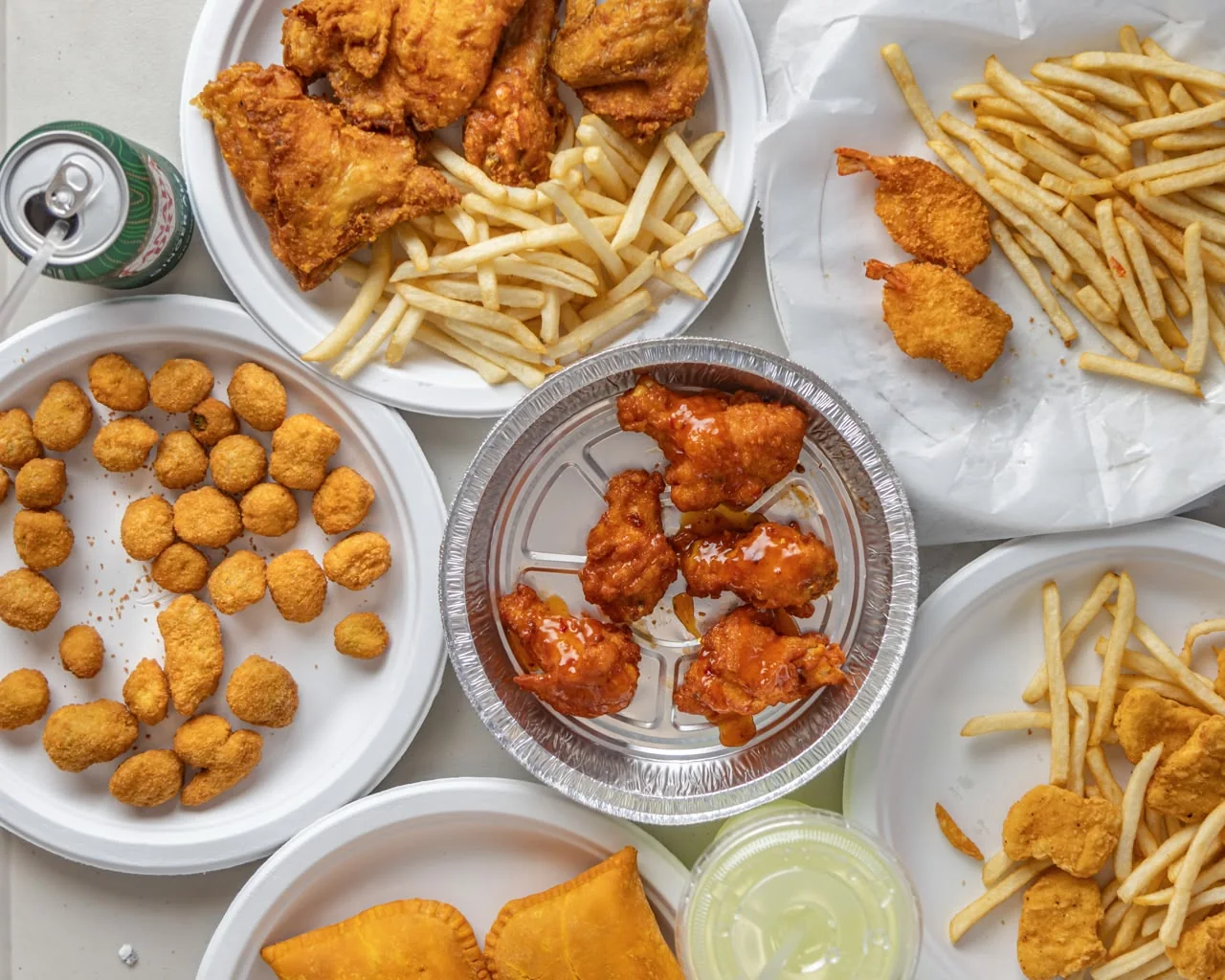 AFC party pack spread of fried chicken, wings, shrimp, nuggets and sides