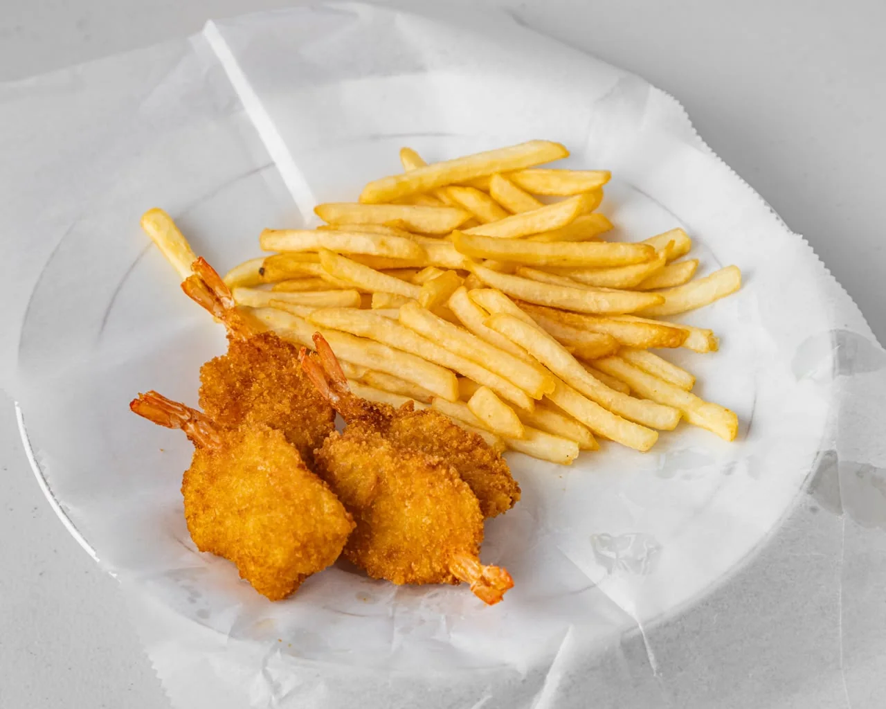 Breaded jumbo shrimp with fries